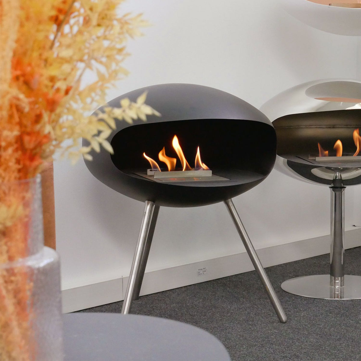 Cocoon Terra Black Bioethanol Fireplace shown in a room setting