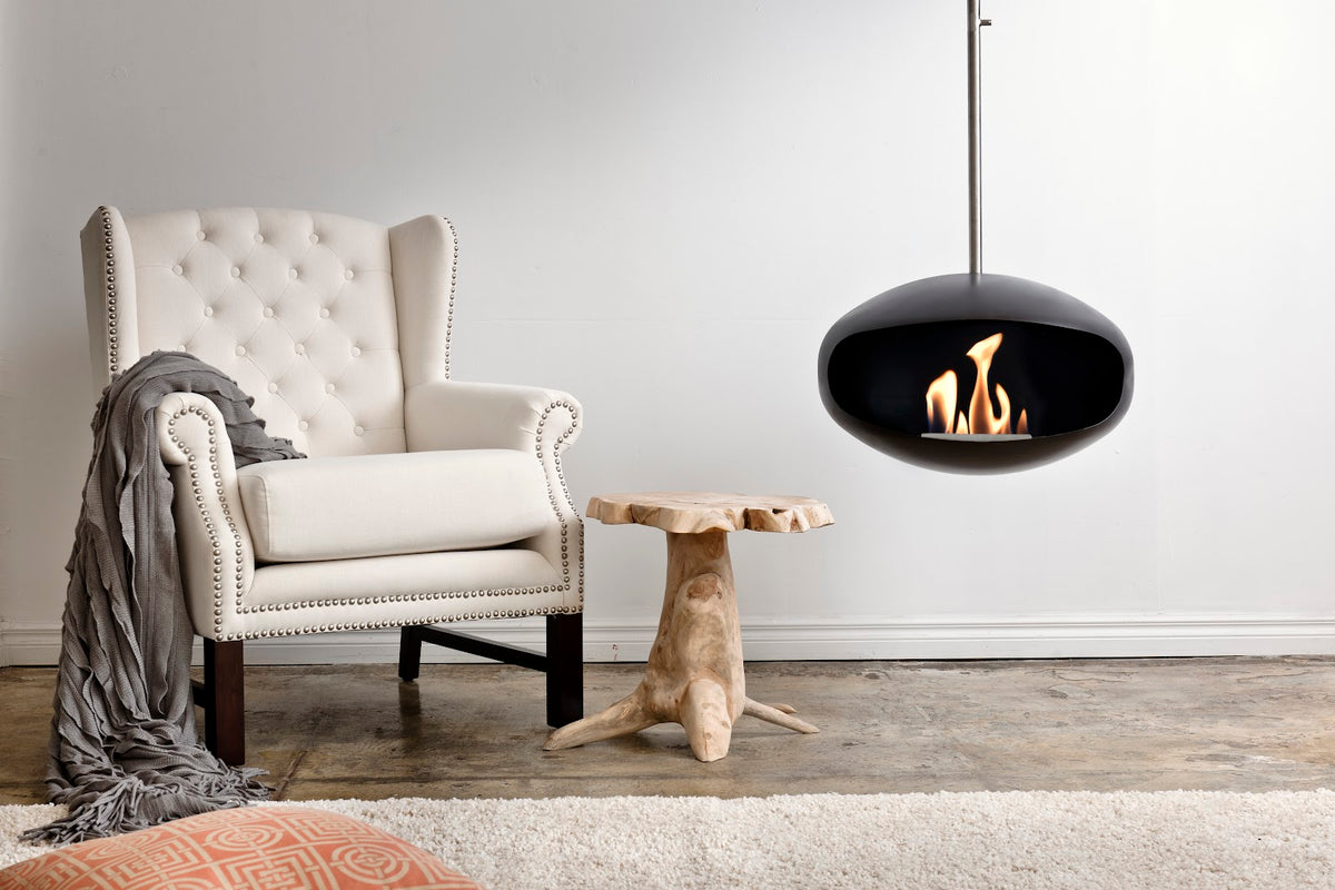 Cocoon Aeris Black Bioethanol Fireplace with Steel Mount shown in a room setting