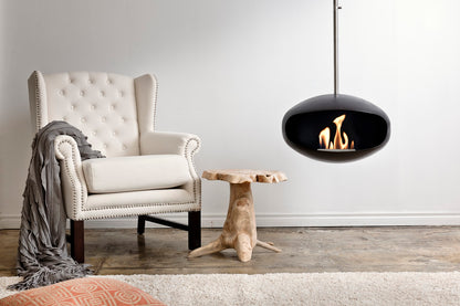 Cocoon Aeris Black Bioethanol Fireplace with Steel Mount shown in a room setting