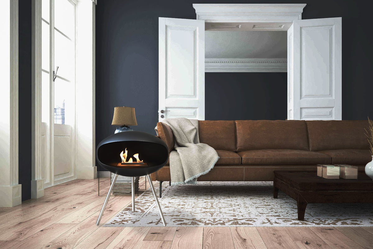 Cocoon Terra Black Bioethanol Fireplace shown in a room setting