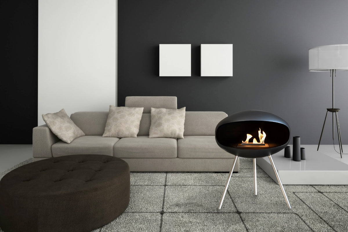 Cocoon Terra Black Bioethanol Fireplace shown in a room setting