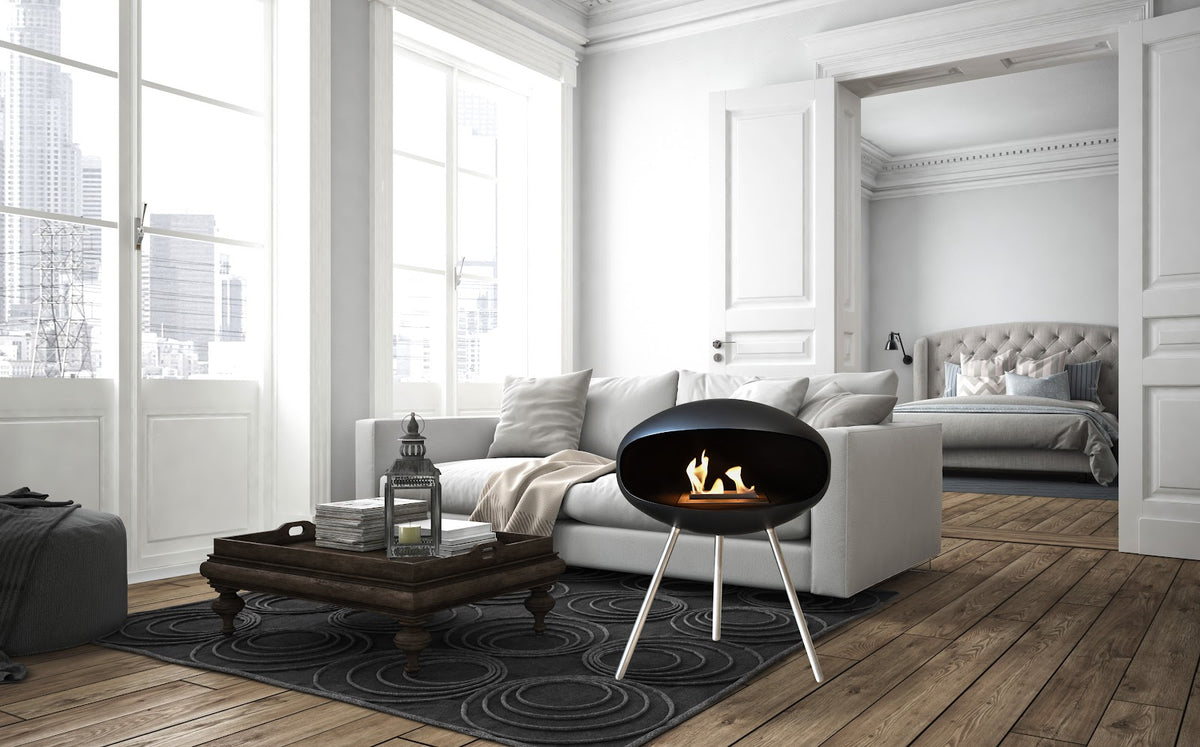 Cocoon Terra Black Bioethanol Fireplace shown in a room setting