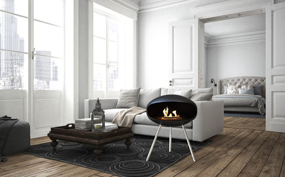 Cocoon Terra Black Bioethanol Fireplace shown in a room setting