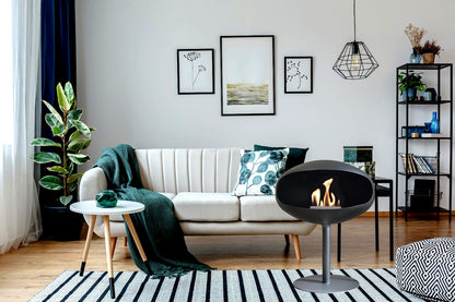 Cocoon Pedestal Black Bioethanol Fireplace shown in a room setting