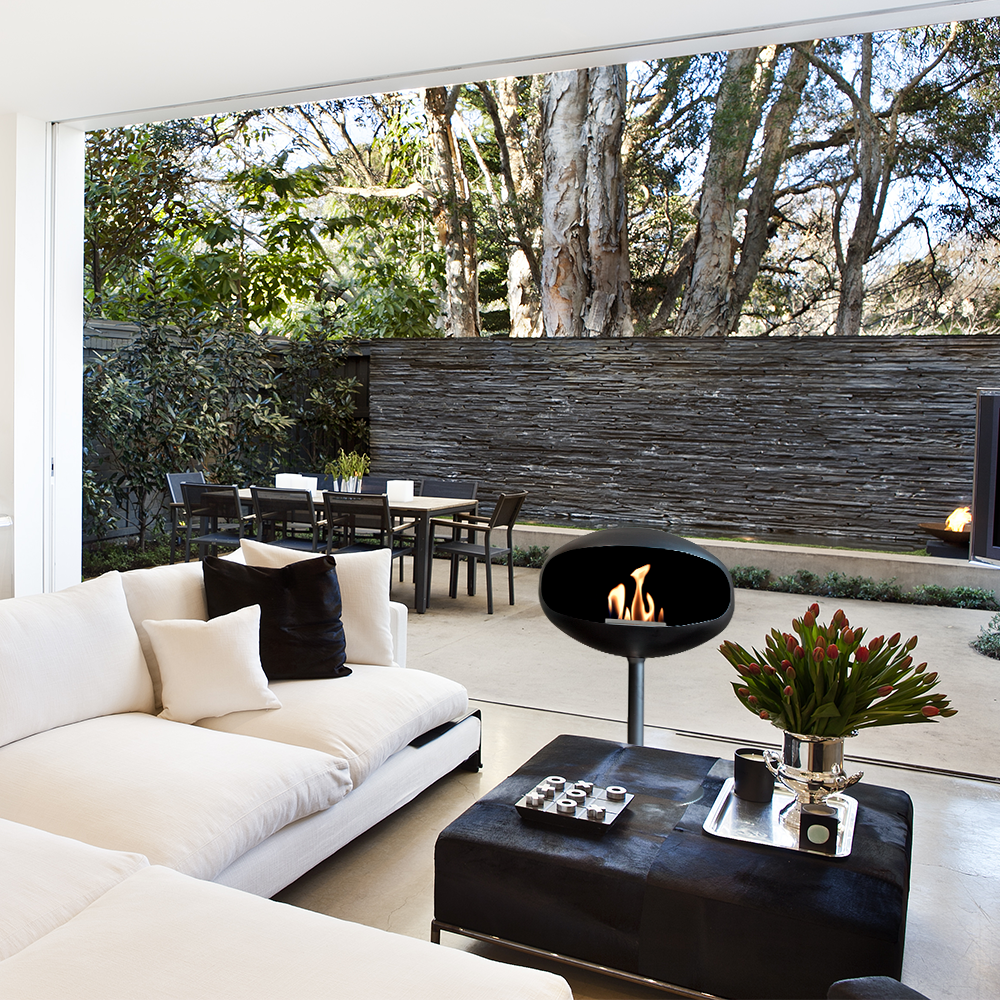 Cocoon Pedestal Black Bioethanol Fireplace shown in a room setting